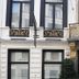 Hotel Colvenier in Antwerp exterior with ornate balcony and restaurant entrance