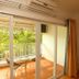 Baan Klang Hua Hin balcony with table and chairs, overlooking greenery in Hua Hin