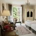 Le Manoir de Gressy guest room in Gressy with twin beds, open balcony doors, and garden view