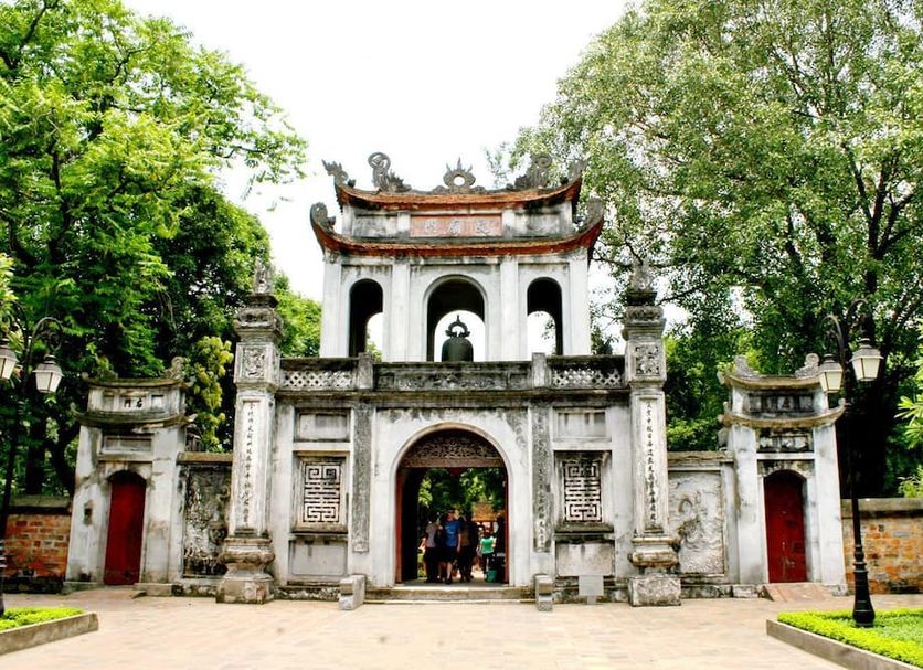Royal Hotel Hanoi entrance with ornate historic gate and trees