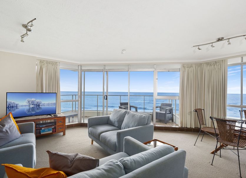 Foreshore Beachfront Apartments in Mermaid Beach living room with ocean view and balcony