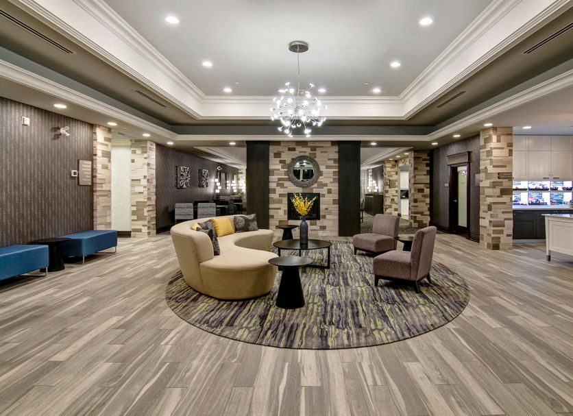 Homewood Suites by Hilton Burlington lobby with seating area and chandelier