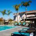 Residence Inn by Marriott La Mirada Buena Park pool with lounge chairs and palm trees in La Mirada