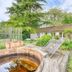 Domaine de Bellevue - Restaurant & Spa in Neufmoutiers-en-Brie with outdoor hot tub and lounge chairs