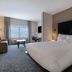 Fairfield by Marriott Inn & Suites Denver Airport at Gateway Park guest room with king bed and window seating in Denver