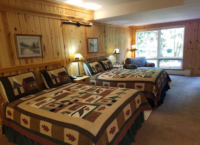 Willard Munger Inn in Duluth guest room with two beds and large window views