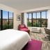 Hampton Inn Huntsville/Village of Providence guest room with large windows and city view