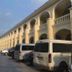 Fontana Hot Spring Leisure Parks in Angeles City, arched hotel facade with parked vans