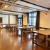 Active Life Madarao in Iiyama: spacious dining room with wooden tables and benches by large windows