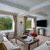 The Ritz-Carlton New York Central Park suite with Central Park views and a seating area in New York