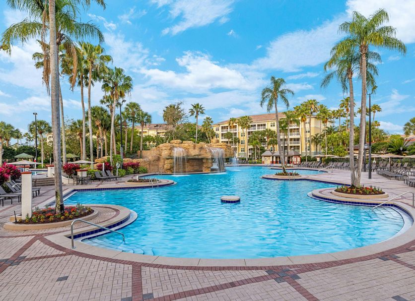 Sheraton Vistana Villages Resort Villas, I-Drive/Orlando pool area with palm trees and a waterfall in Orlando