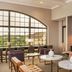 Sheraton Baltimore Washington Airport Hotel - Bwi lobby seating area with large arched window in Linthicum Heights