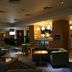 Hampton By Hilton Derby City Centre lounge in Derby with seating, tables and a bar area