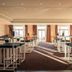 Berggasthof Königstuhl in Heidelberg dining room with tall tables and sunset light