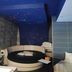 Hotel La Fayette Licola in Giugliano in Campania: starry blue ceiling over a round spa bed and tiled wall