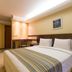 Plaza Bittar Hotel in Brasilia guest room with double bed, desk, and warm lighting