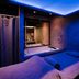 Hotel & Spa Savarin in Rijswijk spa suite with in-room whirlpool tub and blue ambient lighting
