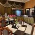 Hotel Kapuas Dharma in Pontianak banquet room with buffet tables and set dining tables