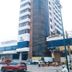 Vung Tau P&T Hotel in Vung Tau, a tall modern hotel with curved glass facade and balconies
