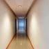 The Loom Rangsit hallway in Pathum Thani with a long glossy corridor and overhead lights