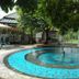 The House of Water in Dongshan Township: circular outdoor water feature with blue mosaic surround