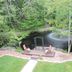 Gite Passion et Tendresse B&B in Shefford with lakeside deck and chairs beside a wooded pond