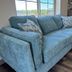 Grand Smokies Resort Lodge in Pigeon Forge room with blue sofa by a window