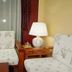 Gold River Side Hotel Jiaxing lounge chairs with wooden side table and lamp