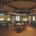 Cherry Maryski Hotel Alexandria restaurant with round tables and ornate ceiling lighting