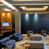 Minas Garden Hotel lobby in Poços de Caldas with lounge seating and large windows