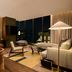 The Hollywood Grande, Autograph Collection suite with city views, seating area, and floor-to-ceiling windows in Los Angeles