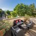 Hôtel La Suite in Villeneuve-lès-Avignon terrace with wicker seating and garden view