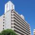 Toyoko Inn Nagoya Marunouchi high-rise exterior in Nagoya against a clear blue sky