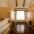 Toyota Shirakawa-Go Eco-Institute twin room in Shirakawa with two single beds and window view