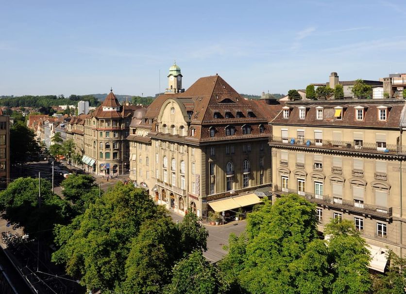 Hotel National Bern in Bern with city view, historic buildings, and tree-lined streets