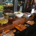 Buffet spread at Marine Beach Hotel Pattaya in Jomtien with fruit bowls, salads and serving utensils