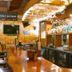 North Creek Lodge at Gore Mountain bar and lounge with wood-paneled interior and hanging glasses in North Creek