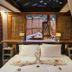 Barefoot Kuata Island, Kuata Island: beachfront cabana bedroom with open view to outdoor deck