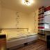 Gästehaus Seewarte in Flensburg guest room with twin beds, window, and black armchair