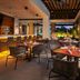 The Santa Maria, a Luxury Collection Hotel & Golf Resort, Panama City patio dining beside an infinity pool at dusk