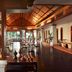 Sofitel Krabi Phokeethra Golf & Spa Resort restaurant with high wooden ceiling in Nong Thale