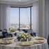 Holiday Inn Express & Suites Ventura Harbor, Ventura: event room with round tables and marina view through windows