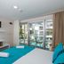 Clover Magic Altinkum Park Hotel room in Side with twin bed and balcony view to pool area