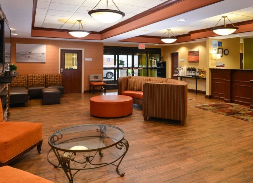 Holiday Inn Express & Suites Dayton-Centerville in Centerville lobby with seating area and front desk