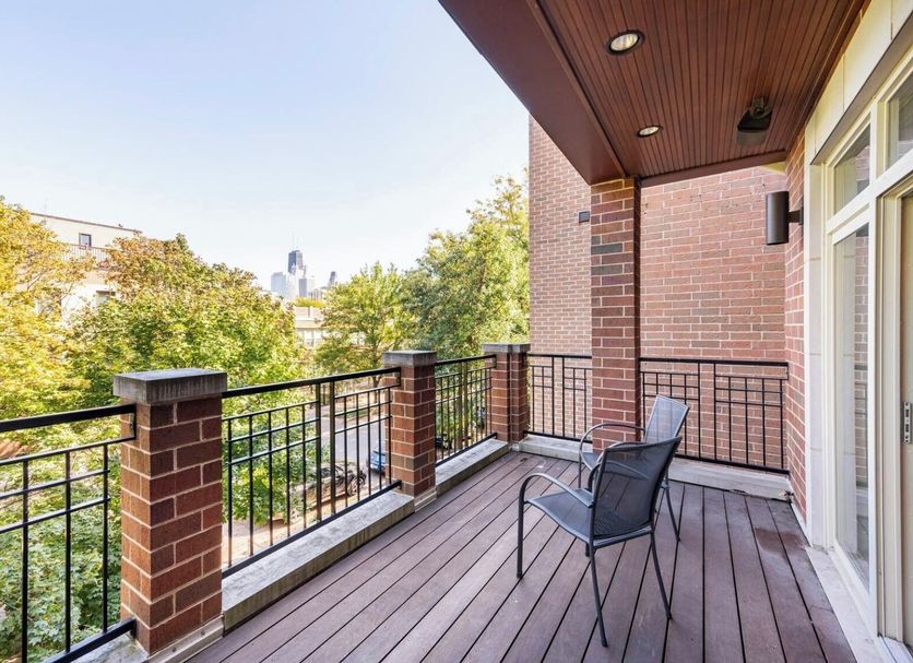 The Sono Chicago in Chicago balcony with city skyline view and outdoor seating