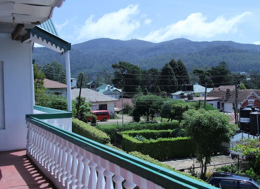 Blue Moon Hotel in Nuwara Eliya balcony view of town and mountains