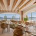 Fiesta Americana Acapulco Villas dining room with arched windows and ocean view in Acapulco