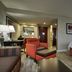 Hampton Inn & Suites Spartanburg-I-26 Westgate Mall room with bed, chair, desk and mirror