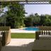 Hotel 4 Stagioni Sensus Spa in Bardolino with a pool view from a shaded patio