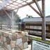 Minshuku Unagi Kohan in Ibusuki featuring an outdoor stone bath under a wooden pergola
